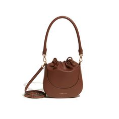 Gmarket_html NOTICE CUSTOMS & DUTIES According to ebay's policy, buyer is responsible for paying tax Seller doesn't take any responsibility for it. [LOVECAT] BASIC 101 Bucket Bag Tan (Brown) - LKF2D300TALC01 Description It is a lucky bag that has been released in the style of loveket. The string that controls the opening and closing of the entrance is applied on both sides, which highlights the details of wrinkles in the front. Comes with two handles and cross straps that can be used as a tote a Modern Brown Hobo Bag With Removable Pouch, Brown Bucket Bag With Removable Pouch For Shopping, Modern Brown Bag For Errands, Modern Brown Bags For Errands, Brown Hobo Bag With Detachable Strap For Everyday, Modern Brown Satchel Bucket Bag, Versatile Brown Bucket Bag For Everyday, Versatile Everyday Brown Bucket Bag, Everyday Modern Brown Bucket Bag