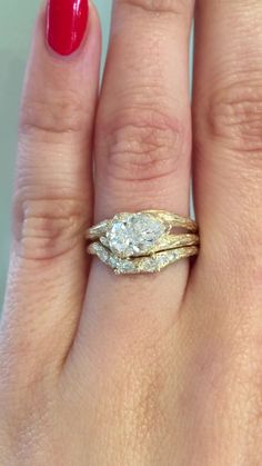 A matching wedding set featuring our Luu - a unique tree bark textured split shank band and pear shaped diamond engagement ring. She's paired with our Isle, a nature inspired contoured diamond wedding band with bark texture and pear and round shaped diamonds. Approx Band Width (mm): 7.4mm - 1.55mm (Luu); 2.3mm - 1.45mm (Isle) Setting Diamond Quality (wedding band stones): Colorless and VS clarity Approx Setting Total Carat Weight (wedding band stones): 0.168 tcw Approx Production Time: 5-6 weeks Ring Stacks, Bella Wedding, Sequoia Tree, Pear Diamond Engagement Ring, Cute Engagement Rings, Future Engagement Rings, Pear Engagement Ring, Dream Engagement Rings, Jewelry Lookbook