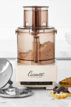 a food processor sitting on top of a counter