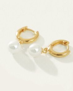 The Alba Earrings in 18K Gold Vermeil are a simple gold hoop with a single Freshwater White Pearl drop. Meaning 'white' in Latin, the Alba earrings bring the wearer wisdom from experience and a sense of purity. Classic Gold Hoop Earrings With Pearl Charm, Classic Gold Huggie Pearl Earrings, Classic White Huggie Earrings For Everyday, Classic White Huggie Earrings As Gift, Classic White Huggie Earrings For Gift, Classic Gold-plated Hoop Earrings With Pearl Drop, Classic Gold Plated Hoop Earrings With Pearl Drop, Classic Gold Hoop Earrings With Pearl Drop, Classic Small Hoop Gold Pearl Earrings