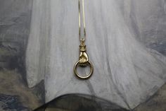 Beautiful Victorian Georgian Antique inspired hand holding ring detailed charm connector necklace in polished 14K gold plated polished brass. Hanging from 925 gold tone sterling silver box chain.  Also available in silver: https://www.etsy.com/listing/1531969438/ The chain is 16" (also available in 14", 18", 20", 22" and 24" chain) ✭ The Veiled Ghost handmade jewelry: https://etsy.me/32CDNCC Adrian Company Vintage apparel: https://etsy.me/3u2Ewbi ✭ Adrian Company Vintage is partnering with The V Ghost Jewelry, Victorian Hand, Box Chain Necklace, Necklace Antique, Vintage Ribbon, Antique Inspiration, Hand Holding, Silver Box, Vintage Apparel