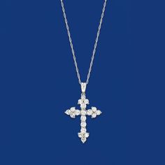 Ross-Simons - 1.00ct t. w. Diamond Cross Pendant Necklace in 14kt White Gold. 20". Inspired by the look of the ancient Saint Thomas Cross, this elegant cross pendant necklace is bedecked with 1.00 ct. t. w. round brilliant-cut diamonds and set in polished 14kt white gold. Suspends from a rope chain with a springring clasp. Perfect as an everyday statement of your faith, or as a special gift for a religious milestone. Diamond cross pendant necklace. Diamond birthstones are the perfect gift for Ap Unique Cross Necklace Womens, Classic Crucifix Cross Necklace For Anniversary, Diamond Cut Crucifix Necklace, Diamond White Cross Pendant Fine Jewelry Necklace, Diamond Cross Necklace, Gift Diamond White Cross Pendant Necklace, White Diamond Cross Pendant Necklace, Classic Diamond White Crucifix Cross Necklace, White Gold Cross Pendant With Diamond Accents