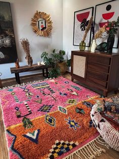 Elevate your space with the vibrant hues of this Pink & Orange Moroccan Rug. Handcrafted with intricate patterns, it adds a touch of exotic charm to any room. Perfect for those who love bold colors and timeless craftsmanship! #MoroccanRug #HomeDecor #InteriorDesign #PinkRug #OrangeRug #BohemianDecor #HandmadeRug #VintageRug #MoroccanStyle #LivingRoomDecor Rug In Kitchen Ideas, Vs Bedroom, Pink Rug Living Room, Moroccan Rug Living Room, Pink Boho Rug, Pink Moroccan Rug, Ett Hem, Vibrant Rugs, Floor Ideas