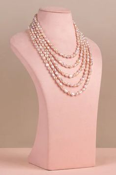 22k gold plated layered necklace with pink pearl and baroque embellishment.
Type: Baroque, Pearl: Natural
Composition: Hypoallergenic Brass
Color: Pink
Weight (in gm): 0.75
Size L (in cm) : 20 - Aza Fashions Pearl Layered Necklace, Rice Pearl Necklace, Palm Cuff, Pearl Embellishment, Contemporary Necklace, Hand Accessories, Greek Jewelry, Pink Necklace, White Necklace