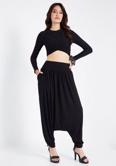 Made from super soft rayon/spandex blend. Comfort is everything with these harem pants. DETAILS: ▪ Pull-on style ▪ Drop crotch silhouette for extra comfort ▪ Ribbed elastic waistband ▪ Ribbed cuffs MEASUREMENTS: Waist: 25" (63.5 cm) stretching to 44" (112 cm) Hips: 60" (152 cm) Length: 38" (96.5 cm)   In Leg Opening: 10" (25 cm) stretching to 18" (46 cm) COLOR: Black 🔸COLOR OPTIONS🔸 Gray: https://www.etsy.com/listing/1496665111/no306-gra Rose Taupe: https://www.etsy.com/listing/1496086723/no30 Loosely Fitted Harem Bottoms For Fall, Fitted Black Harem Bottoms, Fall Harem Pants, Black Harem Yoga Pants, Black Stretch Harem Bottoms, Low Crotch Pants, Romper Casual, Pants Romper, Black Harem Pants