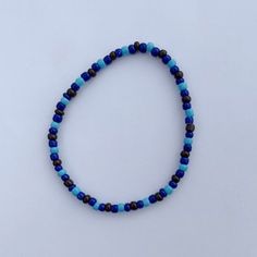 Blue Beaded Bracelet Blue And Black Beaded Bracelet, Blue Bracelet Ideas, Blue Beaded Bracelets, Bead Projects, Black Beaded Bracelets, Black Seed, Bracelet Ideas, Black Bracelets, Blue Bracelet