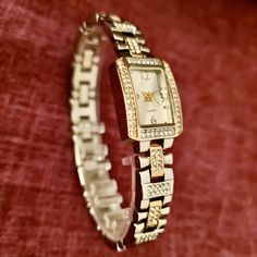 Wrist Watch for Woman, Gold and Silver Colour, Zirconia Stones, Dainty Watch, Easy Usage, Stylish Design, Charismatic Design, Rectangle Design, Pearl Design Dial, Cool Design Total Length: 20 cm Case Diameter: 27 x 16 mm Band Width: 10 mm Case Thickness: 7,5 mm Weigth: 45 gr Elegant Rectangular Analog Jewelry And Watches, Gold Analog Watch With Rectangular Face, Gold Rectangular Analog Watch, Gold Rectangular Analog Jewelry And Watches, Rectangular Gold Analog Watch, Rectangular Metal Dial Watch For Anniversary, Rectangular Metal Watches For Gifts, Rectangular Metal Watches As Gifts, Rectangular Metal Watch For Gift