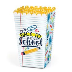 a back to school gift bag with writing on the side and pencils in it