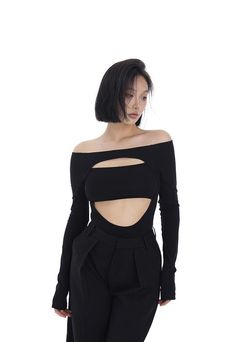 Step into the spotlight with an edgy twist in this Skinny Long Sleeve Multi Cut-Out Bodysuit Top.
Crafted for the daring and confident, this bodysuit boasts a close-fitted silhouette with sophisticated street style appeal. The multi cut-out design adds intrigue to the stretchy, high-quality combed cotton blend, providing both comfort and durability. Its conventional thickness ensures a sleek look without compromising on the easiness of movement.
Pair this versatile must-have with high-waisted tr Bodysuit Top, Cutout Bodysuit, Cut Out Design, Sleek Look, High Waisted Trousers, Combed Cotton, Cut Out, Cotton Blend, Sleek