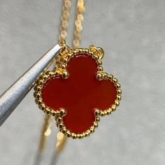 This Clover Pendant Carnelian Necklace is a stunning accessory that adds a touch of elegance to any outfit. Made with high-quality carnelian gemstones, this necklace features a delicate clover pendant that symbolizes good luck and fortune. Elevate your style and channel positive energy with this beautiful necklace. ADDITIONAL INFORMATION Color: Pink Gold, Gold Stone: Carnelian Ref. H121342 Material:- 925 Sterling Silver - 18k Gold Plated- 18k Real Gold ( contact us via instagram) The length of t Trinity Bracelet, Clover Pendant, Carnelian Necklace, Detailed Jewelry, Gold Stone, Beautiful Necklace, Stylish Jewelry, Love Bracelets, Love Necklace