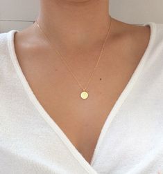 "Om Necklace, Yoga Jewelry, Coin Necklace, Inspirational necklace, Gold Coin Necklace, dainty gold necklace, gold necklace, disc necklace ♥Beautiful and delicate om necklace for the yoga lover in your life ♥Wear this necklace alone or layer it with your favorites. ♥A delicate 14k gold filled chain, with a hint of shimmer adorned with a gold vermeil disc pendant ♥What is vermeil? 22k Gold plated over 925 Sterling Silver ♥Pendant measures 10mm ♥LENGTH - The necklace shown in picture #2 is 18\" lon Gold Dainty Medallion Necklace For Everyday, Dainty Gold Medallion Necklace For Everyday, Minimalist Gold Medallion Necklace With Initial Pendant, Minimalist Gold Initial Pendant Medallion Necklace, Gold Minimalist Medallion Necklace With Delicate Chain, Gold Medallion Necklace With Delicate Chain In Minimalist Style, Dainty Medallion Necklace For Everyday, Dainty Coin Necklace With Initial Pendant And Delicate Chain, Simple Round Disc Necklace With Delicate Chain