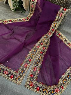 Purple organza dupatta with multi colored embroidered border. Purple Organza Dupatta, Chanderi Dupatta With Floral Embroidery, Designer Purple Dupatta With Embroidered Border, Designer Purple Salwar Kameez With Embroidered Border, Unstitched Purple Saree With Floral Embroidery, Purple Chanderi Traditional Wear With Sheer Dupatta, Semi-stitched Organza Salwar Kameez With Embroidered Border, Bohemian Designer Dupatta For Festive Occasions, Designer Bohemian Dupatta For Festive Occasions