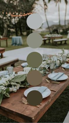 the table is set with plates and place settings for an outdoor dinner party or celebration