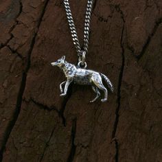 "This beautifully detailed little wolf necklace is completely 3D. It is made of solid sterling silver. This wonderful little wolf is only 1\" across, the perfect size  for an everyday piece that looks great alone or in combination with other necklaces.  ALTERNATIVE STYLES: I make a variety of different animal designs in a number of finishes to suit all styles, tastes and pocketbooks, check them out here:  http://www.etsy.com/shop/mrd74?section_id=5776054 MOON RAVEN DESIGNS: Please check out the Remembrance Necklaces, Wolf Necklace, Wolf Jewelry, Jewelry Care Instructions, Grey Wolf, Charm Pendant Necklace, Hand Cast, Ring Collections, Sterling Silver Charm