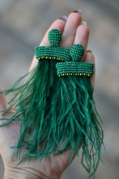 Green gold feather earrings, watterfall beaded clip on earrings Bohemian boho Emerald dark green ostrich tassel Statement woman gift jewelry Dangle Tassel Jewelry For Festival, Handwoven Jewelry As Summer Gift, Adjustable Tassel Earrings For Summer Gift, Adjustable Summer Jewelry With Tassels, Handwoven Jewelry For Summer Gift, Unique Summer Beaded Earrings, Bohemian Earrings With Beaded Fringe, Tasseled Drop Earrings As Gift, Handwoven Dangle Jewelry