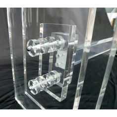 an acrylic display case with multiple tubes in it