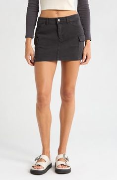 Cargo pockets lend on-trend utility vibes to this weekend-ready miniskirt made from sturdy cotton twill. 13" center front length (size Medium) Zip fly with button closure Front slant pockets; back patch pockets; cargo flap-patch pockets Unlined 100% cotton Machine wash, line dry Imported Cotton Workwear Skirt With Multiple Pockets, Cotton Work Skirt With Multiple Pockets, Utility Cotton Cargo Skirt, Utility Mini Skort With Pockets, Utility Cotton Mini Skirt With Patch Pockets, Utility Cotton Skirt With Patch Pockets, Cotton Utility Skirt With Patch Pockets, Cotton Cargo Skirt With Patch Pockets For Work, Fitted Mini Denim Skirt