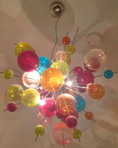 a colorful chandelier hanging from the ceiling