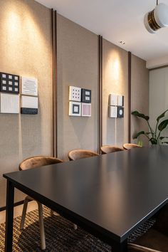 an empty conference room with chairs and a long table in front of the boardroom