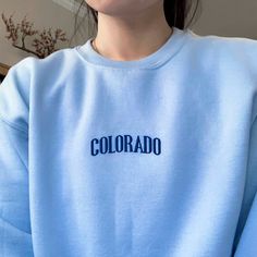 "*Sizes are unisex and fit true to size. I'd suggest sizing up for a more relaxed fit. *these sweatshirts are extra comfy when oversized \"Colorado\" embroidered on a comfy cute crewneck. A sturdy and warm sweatshirt bound to keep you warm in the colder months. A pre-shrunk, classic fit sweater that's made with air-jet spun yarn for a soft feel and reduced pilling. Your new favorite sweatshirt! * 50% cotton, 50% polyester * Pre-shrunk * Classic fit with no center crease * 1x1 athletic rib knit c California Sweater, Cute Crewneck, Embroidered Crewneck, Christian Sweatshirt, Vintage Sweaters, Vintage Sweatshirt, Fitted Sweater, Winter Fashion Outfits, Rib Knit