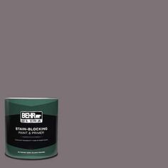 a can of behr paint on a gray background with the words stain - blocking