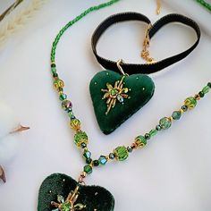 Handmade beaded emerald heart shaped velvet jewelry set: earrings and necklace. You may choose 2 variations: velvet choker or beautiful sparkling beads on the neck. Or both for any events! Velvet heart pendant and earrings embroidered with shiny crystal and rhinestone beads! Each element sewd by hands.Velvet choker with stainless steel chain. This is unique high quality hand work. It will be a wonderful gift! Perfect Valentines day gift! It will compare for different clothes and moments. !!!!Loo Heart Jewelry Set, Unique Valentines Day Gifts, Velvet Heart, Heart Shaped Jewelry, Velvet Jewelry, Set Earrings, Earrings And Necklace, Unique Valentines, Velvet Choker