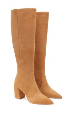 A blocky heel takes your look to new heights in this boot that's modernized by a pointy toe. 3 1/4" heel Leather upper, lining and sole Imported Tall Block Heel Boots For Fall, Wide Calf Boots With Block Heel For Work, Block Heel Boots With Suede Lining And Medium Width, Block Heeled Boots With Suede Lining Medium Width, Medium Width Block Heel Boots With Suede Lining, Workwear Almond Toe Boots With Stacked Heel, Workwear Heeled Boots With Stacked Heel And Almond Toe, Tall Block Heel Boots For Work, Spring Workwear Heeled Boots With Suede Lining