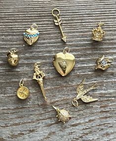 These are retired charms from a charm necklace. The stones are CZ and the gold vermeil is bright with no loss. I have added sturdy gold filled jump rings. They have all stones intact. All charms are 3D and sparkle! Yellow Gold Charms For Jewelry Making, Yellow Gold Charms With Lobster Clasp For Jewelry Making, Gold-plated Charms With Removable Features, Gold Charms With Removable Details For Everyday, Dainty Yellow Gold Charm Necklaces With Removable Charms, Gold Plated Pendant Charms With Removable Features, Dainty Yellow Gold Charm Necklace With Removable Charms, Dainty Yellow Gold Necklaces With Removable Charms, Gold Charm Bracelet With Vintage Charm For Gift