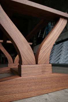 a close up of a wooden table with an interesting design