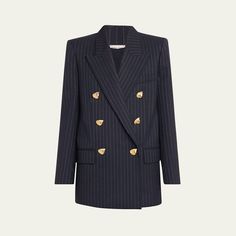 Oscar de la Renta tailoring jacket in an allover pinstripe finish features gold-tone buttons at front  Double-breasted front Peak lapel collar  Two-row button front  Long sleeves; button cuffs  Front welt pocket; side flap pockets  Back vent  Mid-length  Relaxed fit  Virgin wool/elastane Dry clean Made in Italy