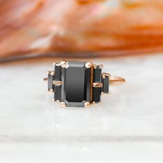 Emerald Cut Black Diamond Ring, Black Diamond Jewelry, Unique Diamond Ring, Art Deco Diamond Ring, 14k Gold Diamond Ring, Black Diamond Ring - Etsy Modern Black Diamond Wedding Ring, Black Sapphire Ring For Anniversary, Timeless Black Rings With Prong Setting, Timeless Black Sapphire Ring For Anniversary, Modern Black Emerald Cut Jewelry, Black Diamond Rings For Evening, Black Sapphire Ring With Polished Finish For Anniversary, Timeless Black Sapphire Ring As A Gift, Black Sapphire Ring In 14k Gold