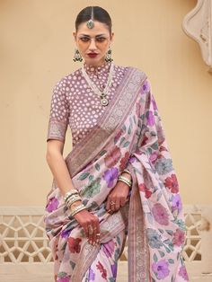 This fascinating baby pink floral printed silk traditional saree with blouse is a stunning choice for weddings, festivals, and other special occasions. The vibrant baby pink color of the saree, paired with the intricate floral print work and zari weaving, makes it a standout piece that is sure to turn heads wherever you go.
The saree comes with a matching light brown color silk blouse that also features printed work and zari weaving, adding to the overall elegance and charm of the ensemble. The Eid Cotton Silk Traditional Wear With Floral Print, Art Silk Floral Print Pre-draped Saree, Traditional Pre-draped Saree With Floral Print For Eid, Traditional Floral Pre-draped Saree For Eid, Traditional Cotton Silk Wear With Floral Print, Unstitched Blouse With Floral Print And Traditional Drape, Semi-stitched Cotton Silk Traditional Wear With Floral Print, Semi-stitched Traditional Wear With Floral Print, Traditional Floral Print Cotton Silk Wear