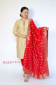 Soft golden straight kurta set with Banarasi silk red dupatta. Available in only size 38 (UK: 10-12) It has hand emb. details on the tops . Model: UK size 8, Height: 5'2 . If interested please message us.  -Makhamali Red Slub Silk Traditional Wear With Dupatta, Red Semi-stitched Slub Silk Churidar, Red Traditional Slub Silk Kurta, Traditional Red Slub Silk Kurta, Red Slub Silk Traditional Churidar, Red Unstitched Slub Silk Churidar, Unstitched Red Slub Silk Churidar, Red Slub Silk Dupatta With Resham Embroidery, Red Raw Silk Churidar With Gota Work