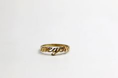 "Personalized name ring, made of solid 14k gold. A beautiful and dainty ring, customized especially for you. 14k yellow gold, cursive letters ring with a matte finish. A customized solid gold ring made just for you. Personalize the ring with any name or word you choose. It can be your name, a name of a loved one, a child's name, or any word that carries a special meaning or inspiration. This elegant and dainty 14k gold ring is a wonderful gift idea for a special woman in your life or for yoursel Minimalist 14k Gold Custom Name Ring, Minimalist Custom Name 14k Gold Ring, Customizable Minimalist 14k Gold Engraved Ring, Personalized 14k Gold Initial Ring For Promise, Customizable 14k Gold Promise Jewelry, Customizable 14k Gold Jewelry For Promise, 14k Gold Stackable Rings With Custom Name For Anniversary, Custom Name 14k Gold Stackable Rings For Anniversary, Classic 14k Gold Customizable Rings