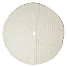 a white circular pad on a white background