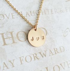 "Couples Initial Necklace - 14K Gold Filled - Mothers Gift - Name Necklace - Initial Necklace - Personalized Necklace - Gift for Her - 11mm * Dimensions: 11mm Diameter 14K Gold Filled Circle Disc Pendant * Necklace Chain Length: Available in 14in, 16in, or 18in ---------------------------------- HOW TO ORDER 1. Select the length that you would like from the drop down menu. * This item only comes in Font Type 3 (1.5mm)* This listing is for (1) necklace. Please feel free to let us know if you have 14k Gold Name Jewelry For Valentine's Day, 14k Gold Round Pendant Charm Necklaces For Wedding, 14k Gold Round Pendant Charm Necklace For Wedding, 14k Gold Charm Necklace For Anniversary, 14k Stamped Rose Gold Jewelry For Valentine's Day, 14k Gold Necklace For Valentine's Day, Rose Gold 14k Stamped Jewelry For Valentine's Day, 14k Gold Jewelry For Anniversary, Valentine's Day Gift, Valentine's Day Sterling Silver 14k Stamped Jewelry