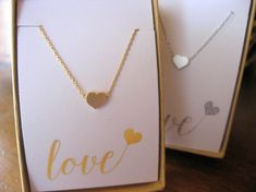 I love this dainty heart necklace.  It is the perfect inexpensive VALENTINES GIFT for the Wife, Girlfriend, or Daughter. Heart Cut Heart Necklace For Mother's Day Wedding, Heart Cut Heart Necklace For Wedding On Mother's Day, Heart Cut Necklace For Wedding And Mother's Day, Heart Pendant Necklace For Valentine's Day Wedding, Delicate Heart Charm Necklace For Wedding, Silver Heart Necklace For Valentine's Day Wedding, Silver Heart Necklace For Wedding On Valentine's Day, White Heart Necklace For Wedding On Valentine's Day, Minimalist Double Heart Charm Necklace For Wedding