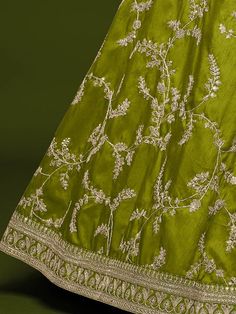 Breathe fresh life into your aspirations with this neon green marriage wear lehenga made of art silk material beautifully crafted with thread, zari embroidery, sequins work, and dori work all overcomes with attached can-can inside. Paired with similar choli material with embroidery lacework and net dupatta with four side lace and embroidery work. This designer lehenga is stitched and can be customized up to 42 inches and come with fully stitched choli material You can adorn this beautiful leheng Green Floor-length Designer Wear Sets, Green Raw Silk Sharara With Dori Work, Semi-stitched Pista Green Raw Silk Sharara, Green Chanderi Sharara For Navratri, Designer Green Art Silk Sharara, Pista Green Art Silk Sharara In Traditional Drape, Green Lehenga With Traditional Drape For Designer Wear, Designer Green Lehenga With Traditional Drape, Floor-length Green Silk Choli