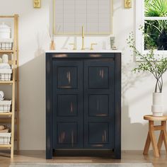 a bathroom with a blue cabinet and white sink