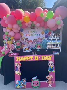 a birthday party with balloons and decorations