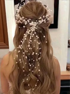 Unleash the magic of your bridal style with our Pearl Cascade Headpiece! Picture strands of enchanting pearls gracefully cascading down, adding a whimsical touch to your hairstyle. This handcrafted accessory is your ticket to a dreamy, fairy-tale look on your special day. Versatile and full of charm, the Pearl Cascade Headpiece is the perfect choice for a bride who wants to sprinkle a bit of magic into her wedding ensemble. Order now and let the enchantment begin! Whimsical Headpiece, Headband For Bride, Gold Headpiece Wedding, Pearl Headpiece Wedding, Engagement Saree, Hair Piece Wedding, Wedding Bridal Hair, Pearl Headpiece, Gold Headpiece