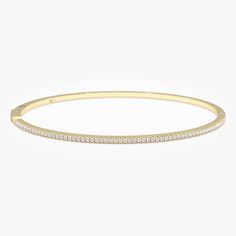 Discover understated luxury with this dainty 14k solid gold diamond bangle bracelet.  Its minimalist design features shimmering genuine diamonds, adding a touch of timeless elegance to your everyday style. Handcrafted with precision, this is a luxurious piece you'll treasure. Handmade  Solid Gold Natural Diamonds Diamond Ct weight 0.42 Bracelet Width 1.6mm Bracelet Height 2.1 mm 🛠 Your Sarah Elise piece is handcrafted with care! Ready-to-ship items go out within 3 business days. Made-to-order pieces typically take 7-10 business days to create. If you need something sooner, please contact us - we'll see if we can make it happen! For estimated shipping dates and tracking, check your Etsy account under 'Orders'. 🚐Orders under $100 are sent with USPS First Class Mail tracking; orders more th Minimalist Gold Cubic Zirconia Bangle Bracelet, Minimalist 14k Gold Bracelet With Diamond Accents, Minimalist White Gold Bangle For Everyday Luxury, Minimalist Bangle With Diamond Accents And Cubic Zirconia, Minimalist Stackable White Gold Diamond Bracelet, Minimalist Brilliant Cut Bangle For Formal Occasions, Minimalist White Gold Stackable Diamond Bracelet, Minimalist White Gold Bangle With Single Cut Diamonds, Minimalist White Gold Bangle With Diamond Accents