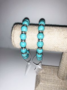 Wire is pliable so it will fit and form to your wrist Gigi Beaded Bracelet Turquoise Teal, Elegant Turquoise Bracelets With Natural Stones, Elegant Adjustable Howlite Jewelry, Nickel-free Round Turquoise Bracelets, Elegant Turquoise Beaded Bracelets With Natural Stones, Adjustable Howlite Beaded Bracelets, Elegant Turquoise Jewelry With Rhinestones, Hand-strung Round Howlite Beads Jewelry, Adjustable Turquoise Crystal Bracelet With Gemstone Beads