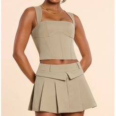 Oh Polly Laurel Square Neck Tailored Top And Maize Pleated Mini Skirt In Taupe, Skirt Is A Size Uk 8, Top Is A Size Uk 10. I’m 5’6, 130 Lbs And Size B Cup And The Set Fits Me Great. Brand New With Tags. Top Armpit To Armpit: 15” Length From Armpit: 9.5” Skirt Waist: 15” Length: 12.5” Taupe Skirt, Tennis Core, Embellished Skirt, 130 Lbs, Skirt And Top Set, Nike Tennis Dress, B Cup, Oh Polly, Neck Crop Top