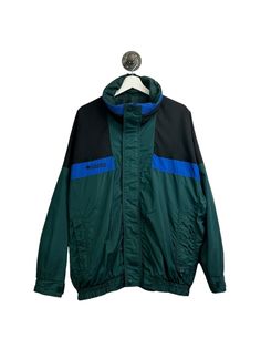 Vintage Columbia Sportswear Nylon Full Zip Windbreaker Jacket Size Large MEASUREMENTS SIZE - L PIT TO PIT - 31.5" LENGTH - 28.5" COLLAR TO CUFF - 32.5" Please note that due to the nature of pre-owned clothing; the size mentioned in the title may not be an accurate representation of the item's fit in accordance with modern sizing guides. Referring to the measurements will help to ensure that your garment will fit properly. CONDITION: 3/4 General wear. Light marks found around. All flaws mentioned Green Nylon Moisture-wicking Windbreaker, Waterproof Half-zip Nylon Windbreaker, Nylon Half-zip Track Jacket With Pockets, Outdoor Half-zip Nylon Track Jacket, Vintage Long-sleeve Nylon Track Jacket, Columbia Sportswear, Windbreaker Jacket, Columbia, Mens Jackets