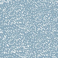 an abstract blue and white background with lots of small dots on it's surface