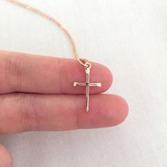 Simple Rose Gold Cross Necklace, Baptism Necklace, First Communion Jewelry, Baptism Gift, Christening Gift, Godmother Necklace, StampedEve♥ Available in Sterling Silver and Rose Gold.♥ Specification. Chain and Components are Sterling Silver/ 14K Rose Gold Filled. Cross is Sterling Silver or Rose Gold Vermeil ( Rose Gold Plated over Sterling Silver ) size 11.5 x 20.5mm. Comes in a satin pouch. Length includes jump ring and clasp♥ IMPORTANT:Usually jewellery in the pictures looks bigger than in re Gift Rose Gold Crucifix Cross Necklace, Baptism And Mother's Day Cross Pendant Jewelry, Cross Jewelry For Baptism And Mother's Day, Rose Gold Cross Necklace As A Gift, Mother's Day Baptism Cross Jewelry, Cross Jewelry For Confirmation And Mother's Day, Baptism Necklace, Godmother Necklace, Satin Pouch