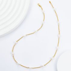 Elevate your neckline with our classic Pearl Clavicle Necklace! Versatile for both single and layered wear, this timeless piece also serves as the perfect chain for showcasing your favorite pendants. Don't miss out on the elegant beauty and endless styling possibilities of this must-have accessory! Material: 925 sterling silver plated with 18K gold, freshwater pearlsPearl: rice-shaped 4mmChain length: 38+3+3cm Elegant Layered Necklace With Adjustable Chain, Elegant Round Layered Necklace With Adjustable Chain, Elegant Pearl Necklace With Chain As Gift, Elegant Pearl Necklace With Chain For Gift, Elegant Pearl Choker Necklace With Clavicle Chain, White Classic Necklace With Delicate Chain, Classic White Necklace With Delicate Chain, Elegant Pearl Necklace With Chain, White Delicate Chain Necklace