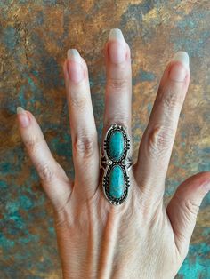 Native American Sterling Silver and Stunning Turquoise Ring Vintage Layaway Available Size 5.5 12.6 grams Such a cool vintage ring!  Before purchasing, please make sure your shipping address is correct in your Etsy account. I will not change the shipping address after purchase due to so much buyer fraud going around. If you purchase and need an address change, we will have to cancel the transaction and start over.  Return Policy- Buyer must contact me within 5 days of delivery to notify me of re Antique Turquoise Ring With Patina, Antique Turquoise Gemstone Ring, Western-style Turquoise Ring With Patina, Vintage Green Turquoise Ring With Inlay, Oval Turquoise Emerald Ring For Collectors, Southwestern Turquoise Rings With Patina, Western Style Turquoise Ring Collectible, Turquoise Ring With Patina For Anniversary, Anniversary Turquoise Ring With Patina