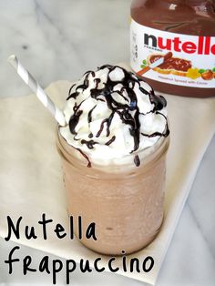 nutella frappuccino with whipped cream and chocolate syrup in a glass jar